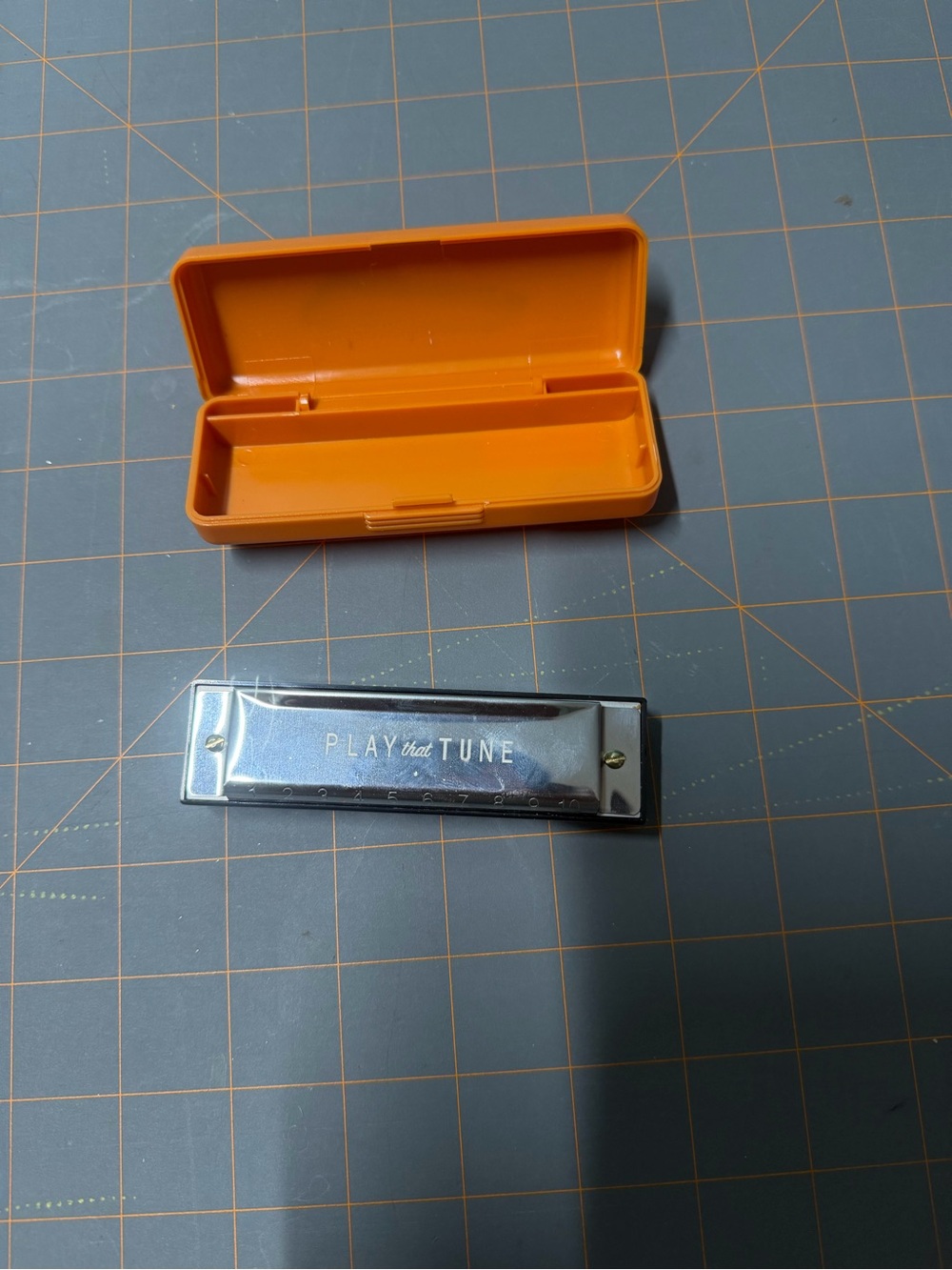 Orange Case with Silver Harmonica - Play That Tune untested